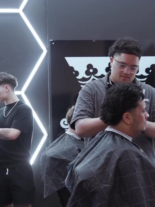 Barber at work in the chair at Kings Society